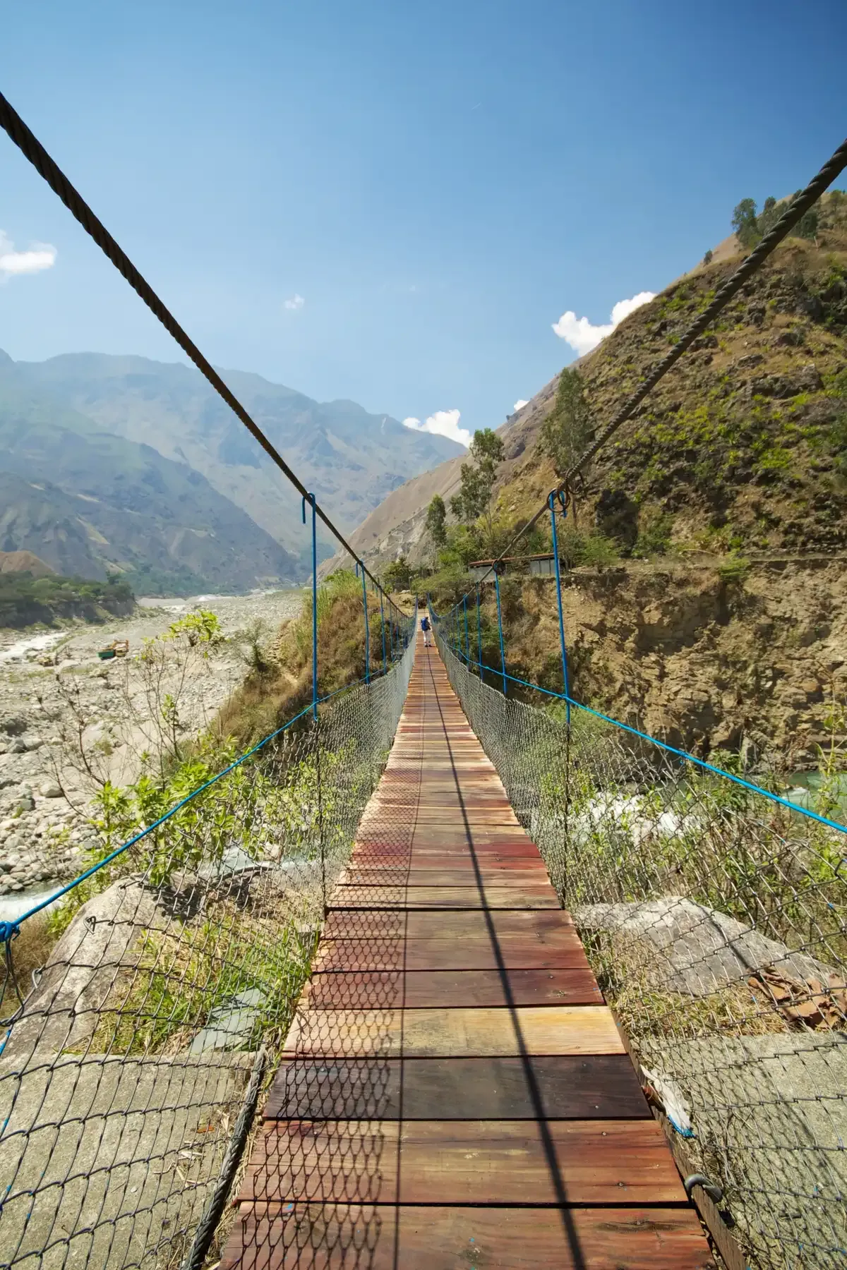 A suspension footbridge over the river near Santa Teresa, on the Salkantay trek route